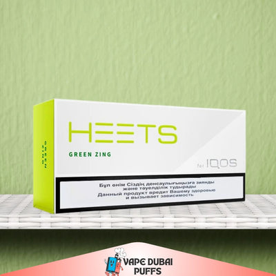 HEETS Green Zing packaging on a shelf with a green background