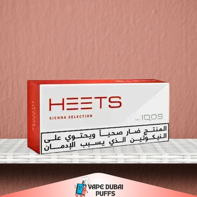 HEETS SIENNA SELECTION box on a shelf with a pink background